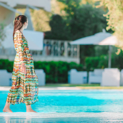 woman-relaxing-hotel-pool-vourvourou