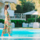 woman-relaxing-hotel-pool-vourvourou