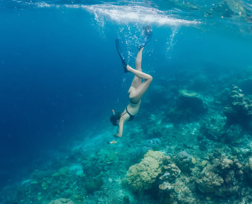 girl-snorkeling-around-vourvourou