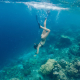 girl-snorkeling-around-vourvourou