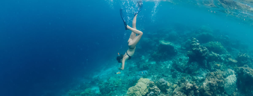 girl-snorkeling-around-vourvourou
